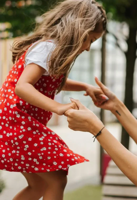 image of a child and a woman who is agency staff for residential childcare