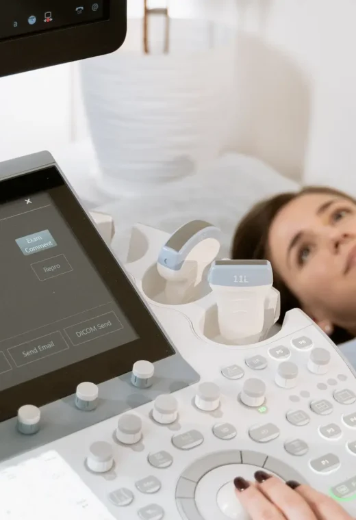 an image of a pregnant woman receiving a pregnancy scan