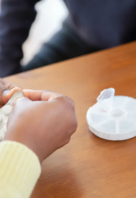 image of a person holding tablets