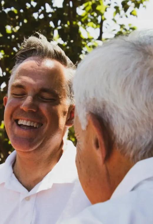 adult care provider with his father wondering how to offset the rising healthcare costs as a caregiver