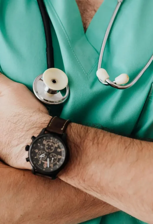 zoomed in image of an urgent care staff member crossing their arms