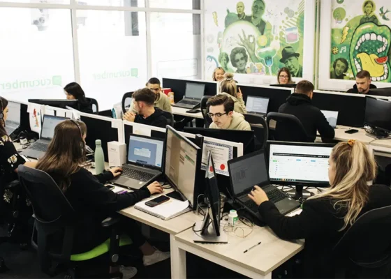 image of people working in an office for the whistleblowing page